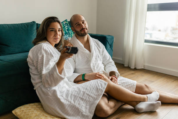 istock Young couple watching TV 2202517307