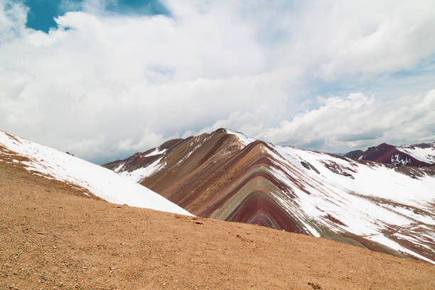 istock Rainbow mountain vinicunca showing its colorful stripes in peru 2202519338