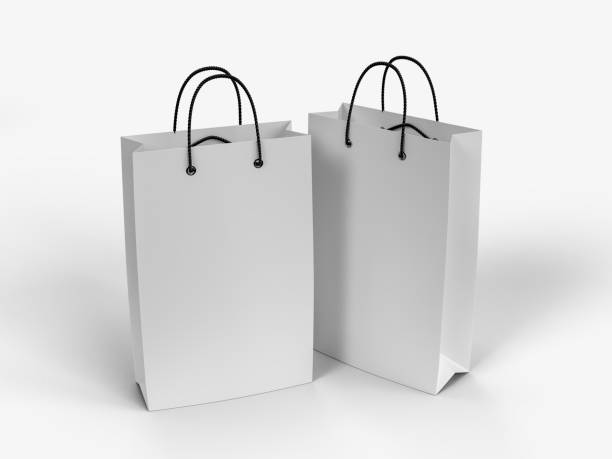 istock 3D Realistic blank shopping bag and handle mockup. Shopping paper packaging template with copy space for supermarket, shop mall, sale merchandise products, branding and corporate identity design 2202522635