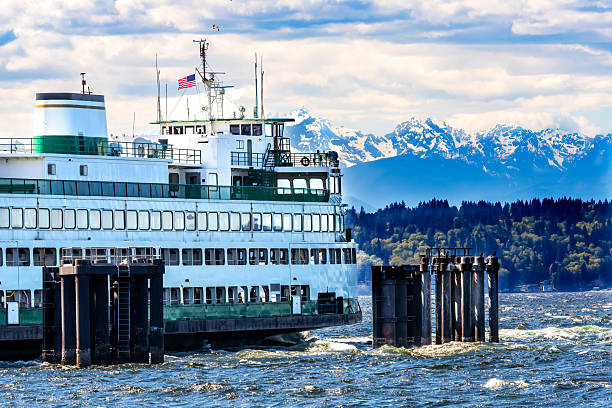 istock Washington State Ferry Dock Olympic Snow Mountains Edmonds Washington. 2202525690