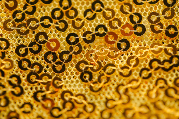 istock Gold sequins iridescent sparkling background.Fabric with sequinsin 2202530241