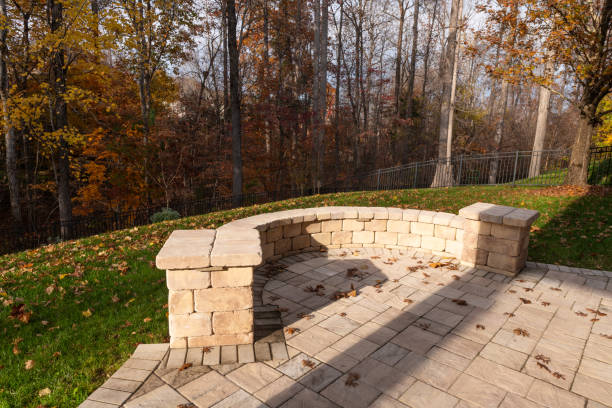 istock Curved Stone Wall in Autumn Backyard 2202530377