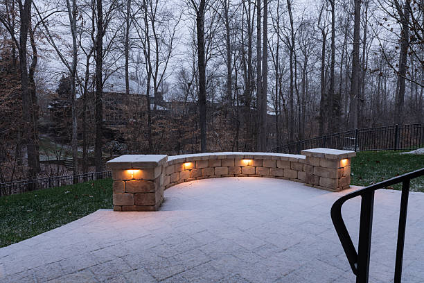 istock Snowy Patio with Stone Wall and Railings 2202530395