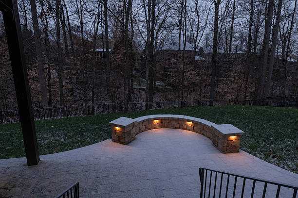 istock Snowy Patio with Stone Wall and Railings 2202530400
