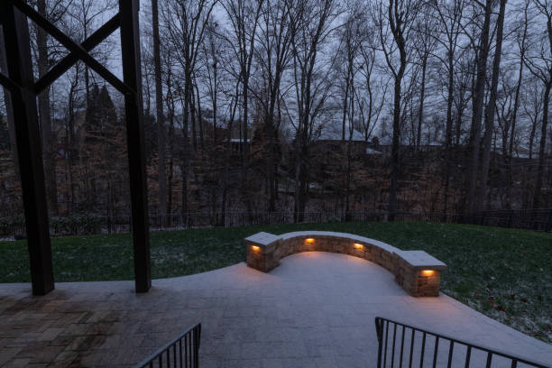 istock Snowy Patio with Stone Wall and Railings 2202530413