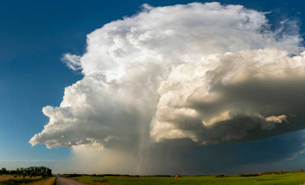 istock Supercell thunderstorm looming over a rural landscape, generating rain and hail 2202530785