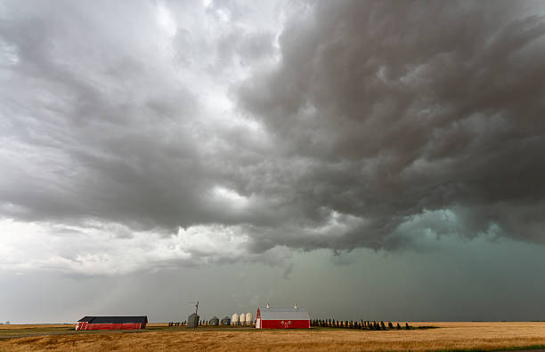 istock Dramatic supercell storm clouds gathering over farm in saskatchewan canada 2202530819