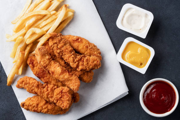 istock Chicken tenders. Fried chicken breast strips 2202534893