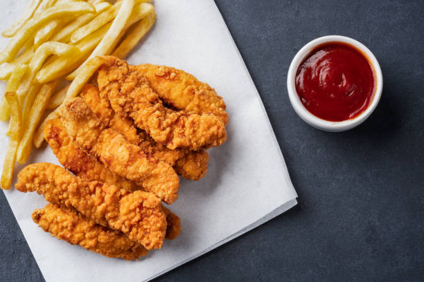 istock Chicken tenders. Fried chicken breast strips 2202534929