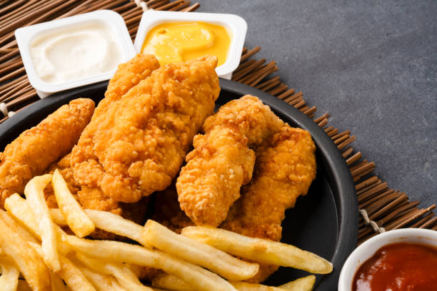 istock Chicken tenders. Fried chicken breast strips 2202534971