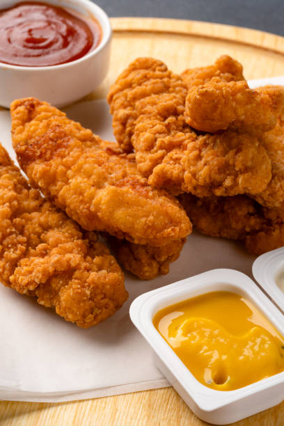 istock Chicken tenders. Fried chicken breast strips 2202535003