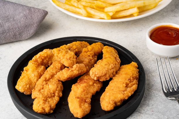 istock Chicken tenders. Fried chicken breast strips 2202535025