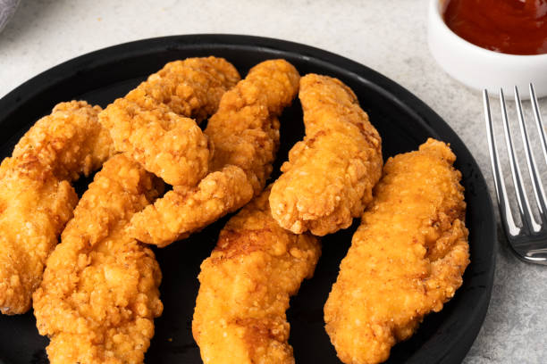 istock Chicken tenders. Fried chicken breast strips 2202535029