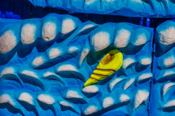Hamrun, Malta - February 23rd, 2025 - Colorful Illustration Featuring a Bright Shell on a Blue and White Background
