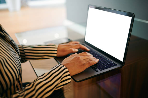 istock Hands of woman Typing on a Laptop with Blank Screen 2202535769