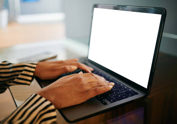 istock Woman's Hand Typing on Laptop in a Modern Home Setting 2202535772