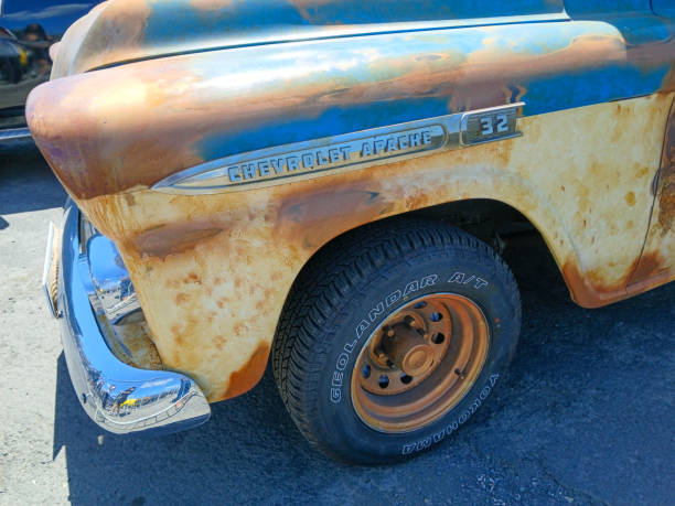 Rusty vintage chevrolet apache 32 pickup truck showing patina and wear Ericeira, Portugal, June 15, 2024, Close up of a rusty vintage chevrolet apache 32 pickup truck, showcasing its weathered patina and classic design distressed rusty vintage pickup truck close up detail stock pictures, royalty-free photos & images