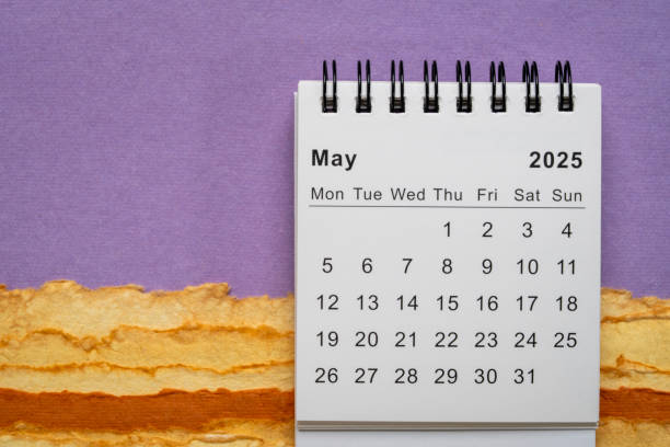 The May 2022 desk calendar on white background.
