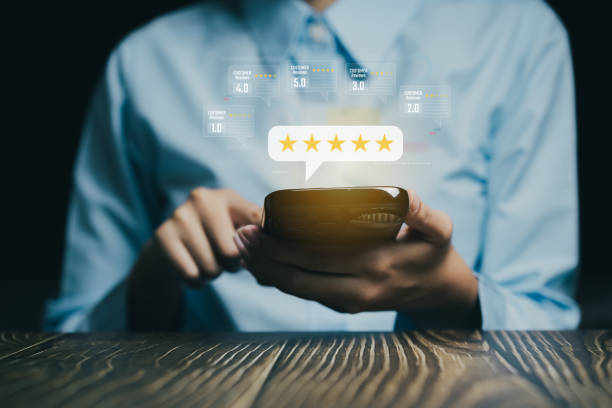 istock User Reviews and Ratings Concept with Smartphone and Five Star Feedback Visualization, Business concept 2202547572