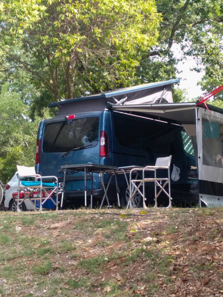 istock Campervan with outdoor setup in nature 2202547737