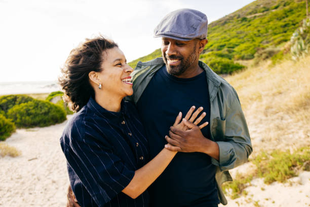 istock Love in the Sand How Beach Walks Bring Couples Closer 2202553628