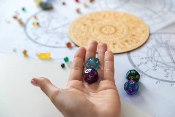 istock Woman numerologist astrologer counts numbers. Selective focus 2202554887