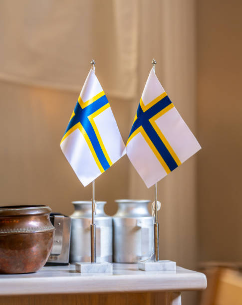 istock Swedish-Finnish flags o a table. 2202559994