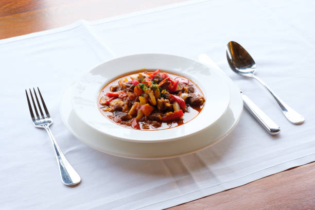 Chinese cuisine with sea cucumber served on a white plate