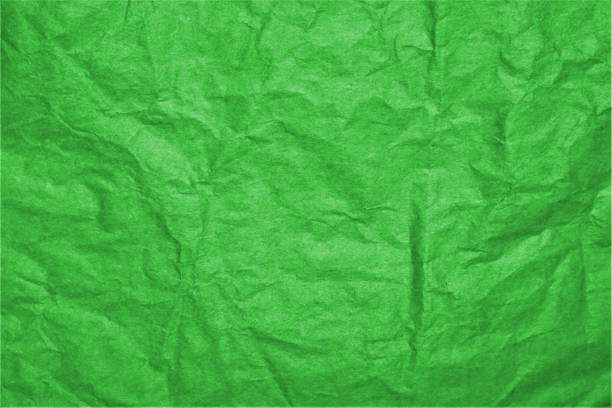 istock Bright Green Wrinkled Paper Background 2202579120