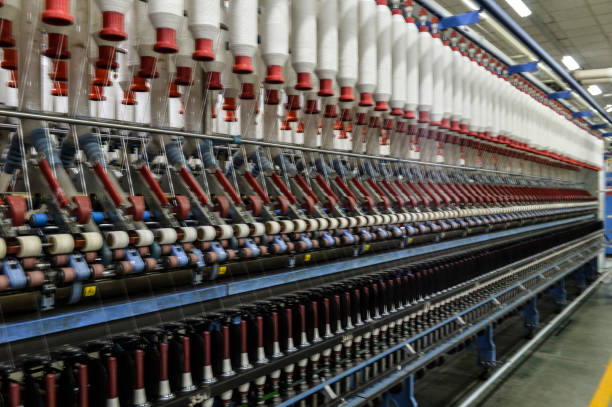 istock Cotton textile factory equipment is in operation 2202581533