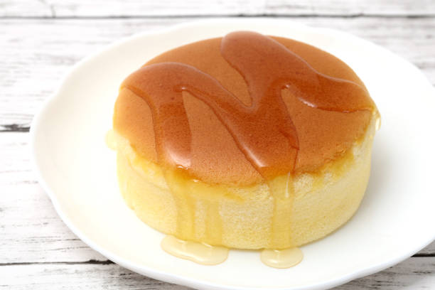 istock Homemade round sponge cake or castella cake with honey 2202583960
