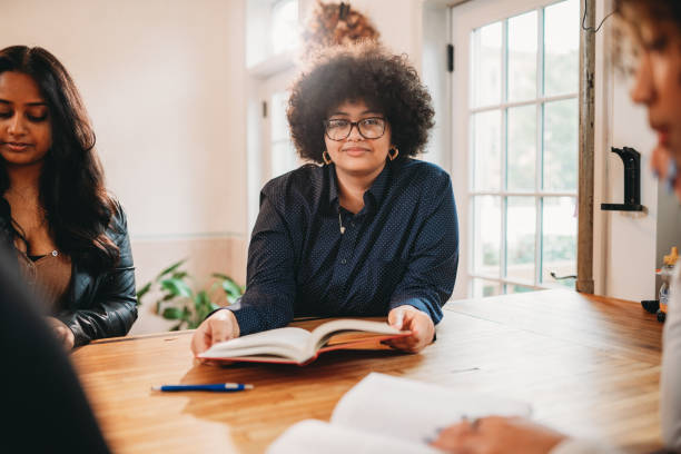 istock Friends are studying together at home 2202587110