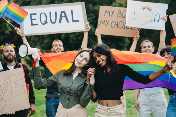 istock People are enjoying an LGBTQIA pride event 2202587309