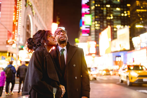 istock Elegant Night Out in Times Square 2202589040