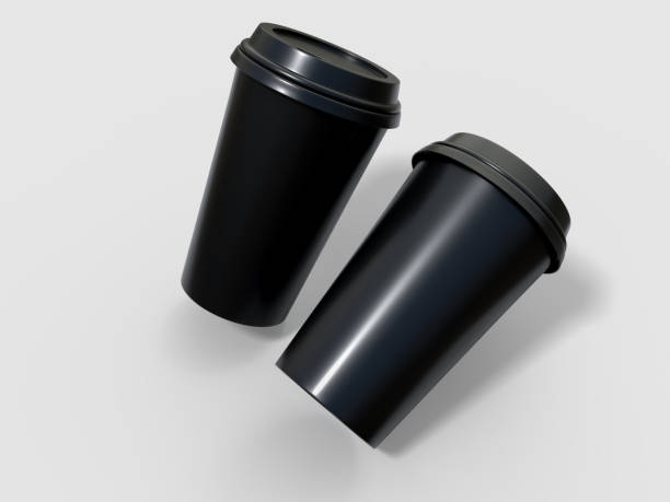 istock 3D coffee cup mockups disposable with plastic lid. Blank black plastic mugs for takeaway hot or cold beverage, milkshake, tea or coffee cups, isolated on background. Mockup packaging for branding 2202592819