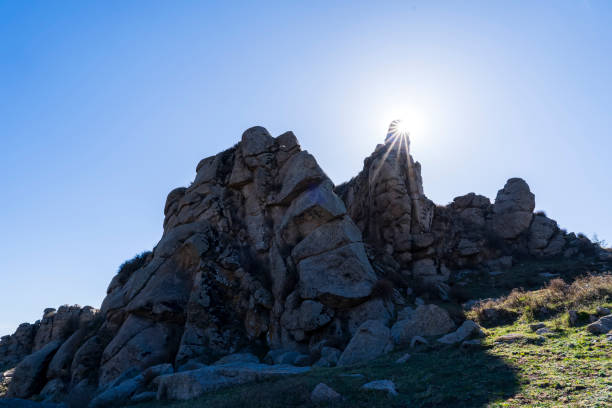 The strange rocks on the mountain are under the blue skyAll kinds of stones on the mountain