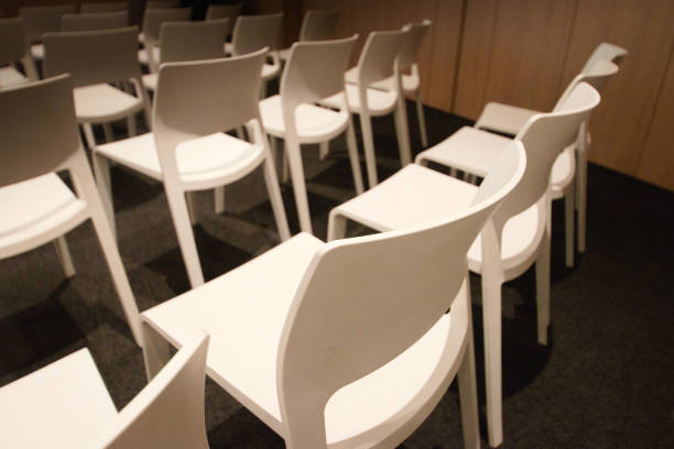 istock Rows of chairs in a large meeting room 2202597855
