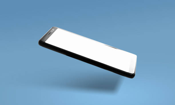 Floating smartphone mockup with blank white screen facing up isolated on blue background. Digital mobile advertisement template. Realistic 3D phone with shadow