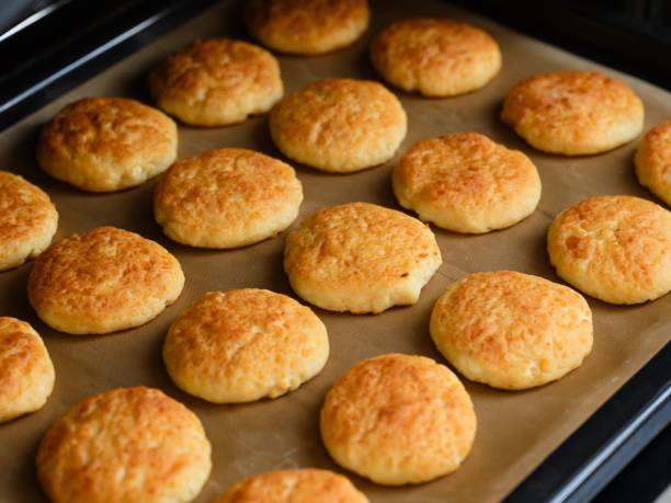 istock Baking tray with curd cheese pancakes (syrniki) 2202612168
