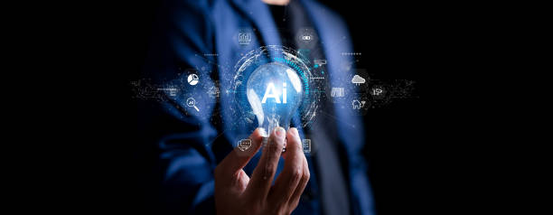 istock Chat with AI or Artificial Intelligence. Young businessman chatting with a smart AI or artificial intelligence using an artificial intelligence chatbot developed by OpenAI. 2202613842
