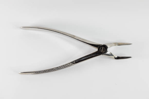 istock Pliers used by dentists to extract teeth. 2202614195