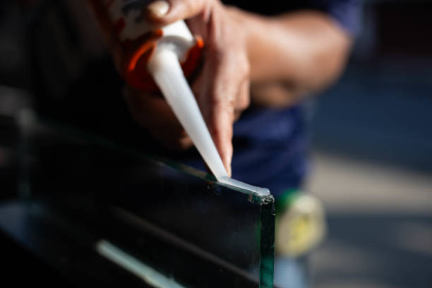 istock silicone adhesive with a glue gun 2202614467