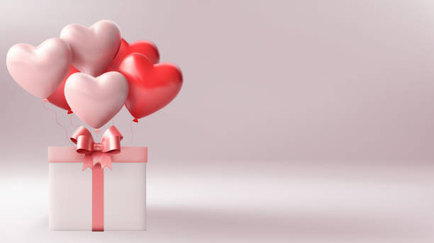 istock Happy valentines day with creative love composition of the hearts. Gift box with red ribbon bow 2202614516
