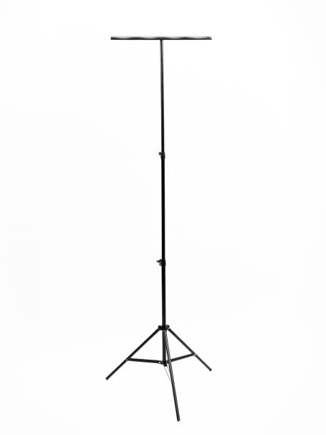 istock Black tripod with a metal comb. White background. 2202629934