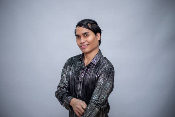 In studio with gray background