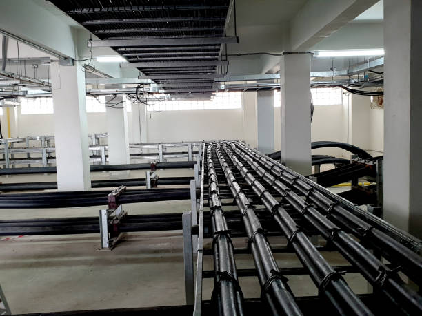 istock Control cable installation at upper tray and 115kV and 22kV power installation at lower cable tray 2202632173