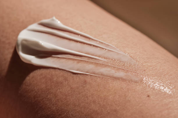 istock White body cream on dry human skin. 2202637190