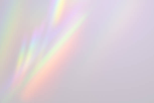 istock Radiant holographic light flare with soft pastel gradient background. 3D Rendering 2202639612