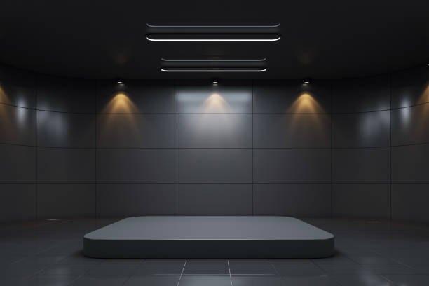 istock Dark exhibition room with spotlights and empty podium. 3D Rendering 2202639616