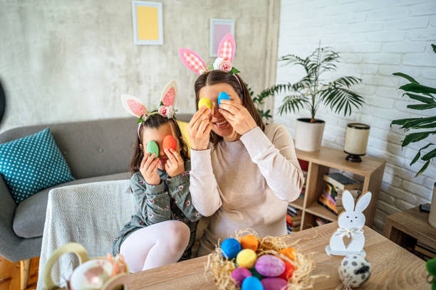 istock Mother and daughter having fun on Easter 2202640923